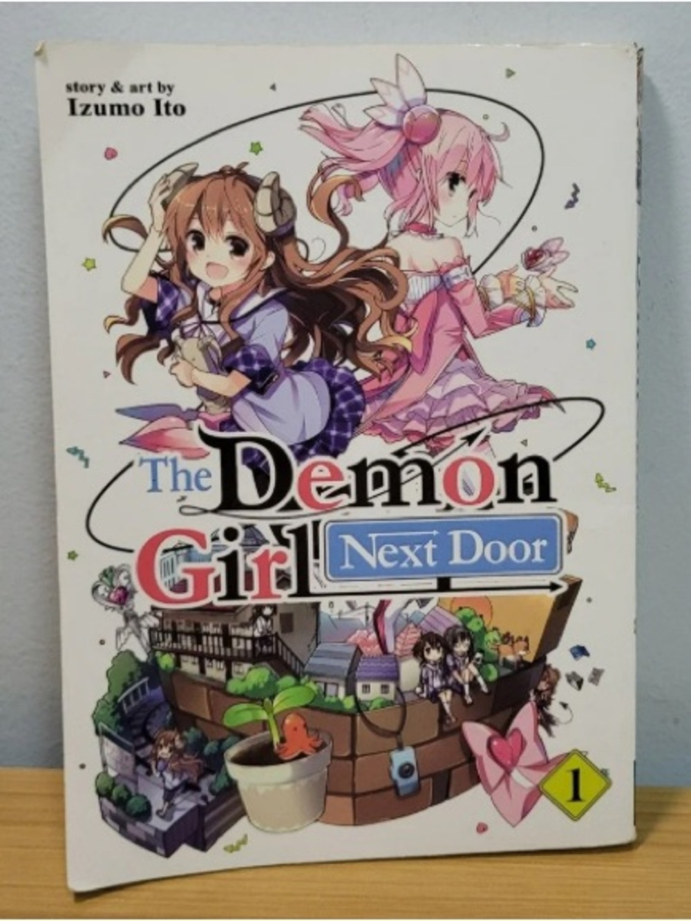 The Demon Girl Next Door Graphic Novel Cover Art - Pink & White